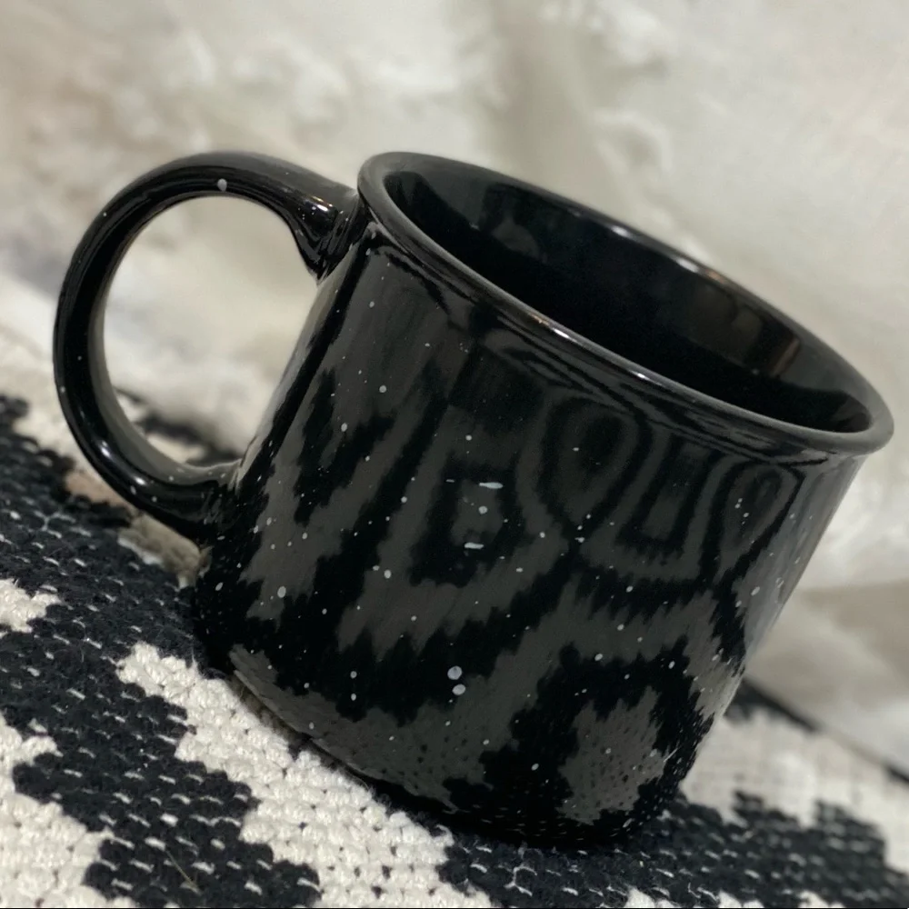 Adventure begins here black ceramic speckled mug